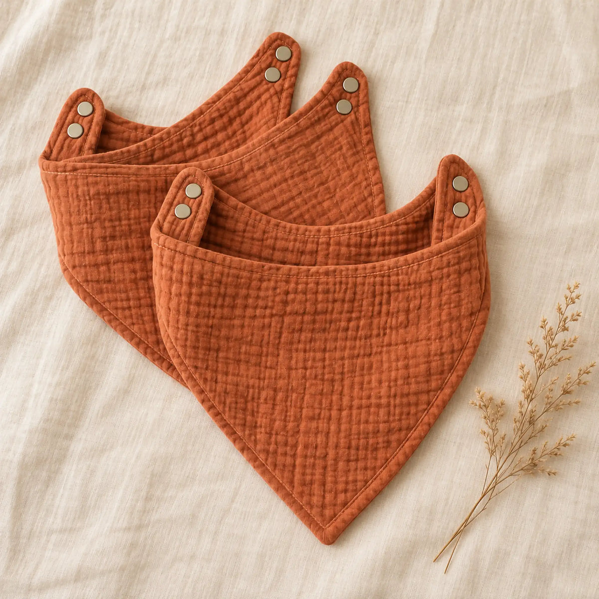 The Cherish Company — Ten-Pack Snap-On Muslin Bibs in Orange