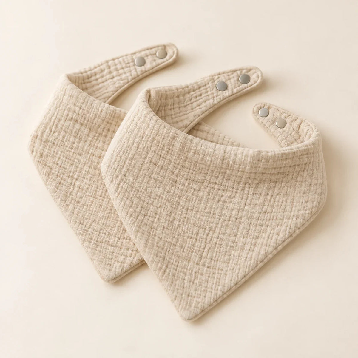 The Cherish Company — Ten-Pack Snap-On Muslin Bibs in Beige