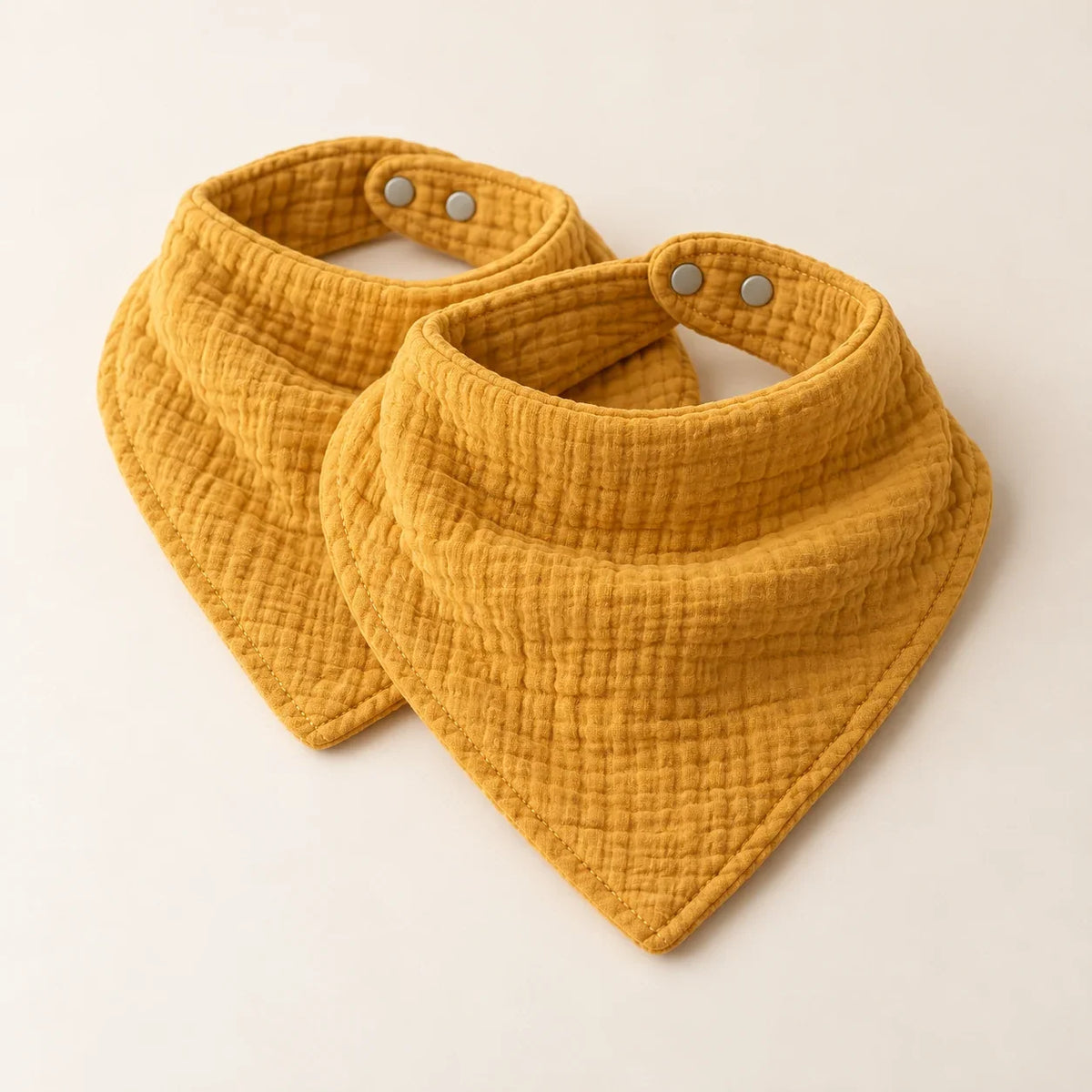 The Cherish Company — Ten-Pack Snap-On Muslin Bibs in Yellow