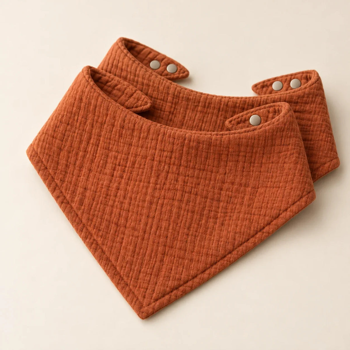 The Cherish Company — Ten-Pack Snap-On Muslin Bibs in Cinnamon